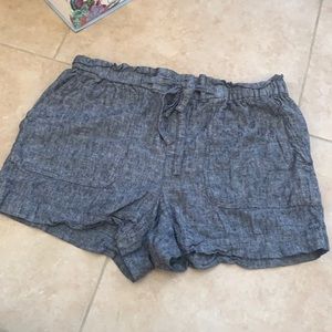 Women’s denim color paper bag high waist shorts.